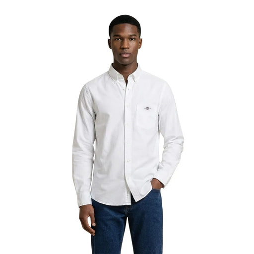 White long-sleeved cotton button-down shirt with subtle embroidered logo on left chest pocket by Gant Men Shirt