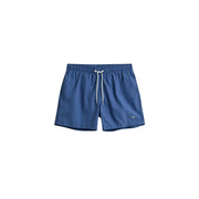 Gant men swimwear light blue polyamide board shorts with white drawstrings and a small logo on the lower right leg