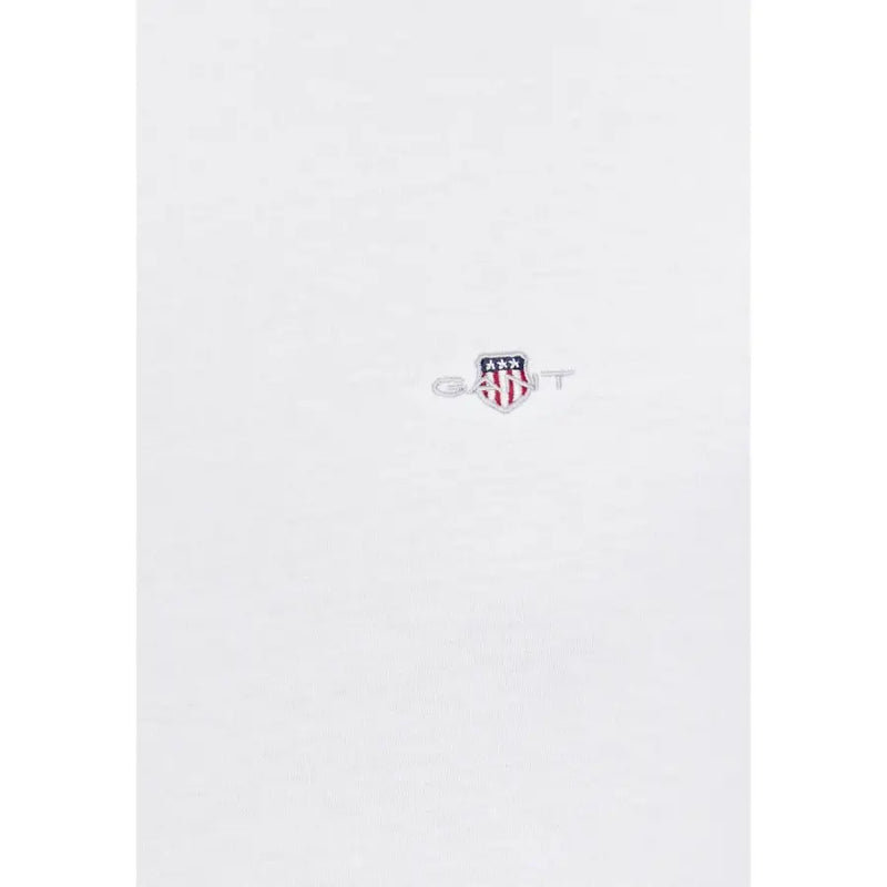 T-shirt homme Gant blanc 100% coton, col rond, manches courtes, logo brodé discret et rayures rouges, blanches et bleues