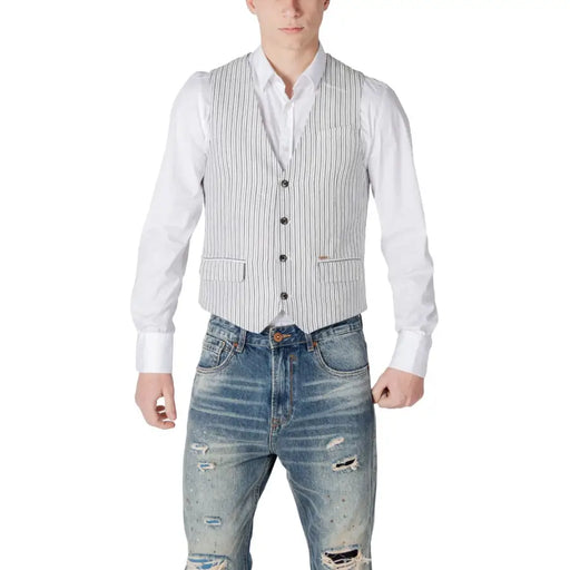 Striped vest with button closure and pockets, white background.
