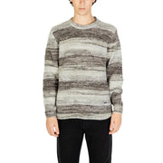 Striped sweater with a mix of gray and white colors, made from soft cotton material.