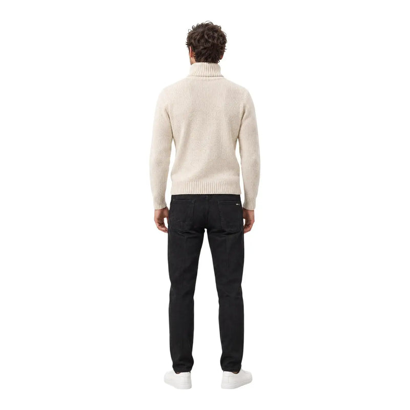 A cream-colored ribbed cotton turtleneck sweater with a classic fitted silhouette for men by gianni lupo