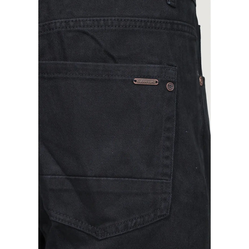 Back side of Gianni Lupo men cotton black denim jeans with subtle texture and metallic brand tag on the pocket