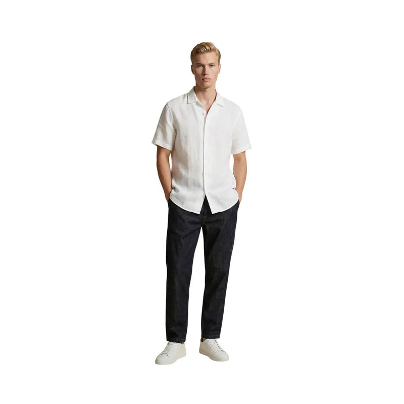 White short-sleeved linen shirt with classic collar and button-down front paired with gianni lupo blue cotton stretch slim fit jeans
