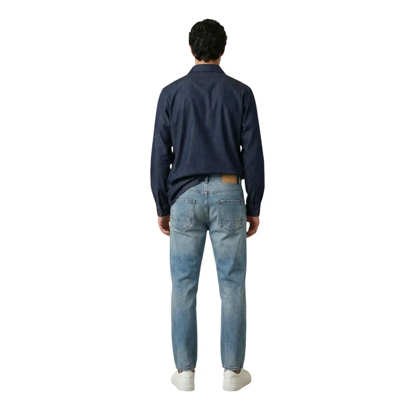A pair of light-wash denim jeans with classic five-pocket design and subtle fading for men by gianni lupo