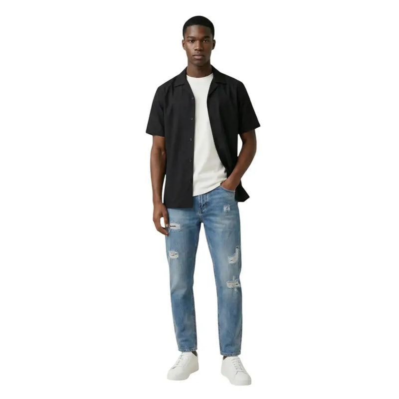 Blue distressed denim jeans with a straight-leg cut featured alongside gianni lupo men shirt for casual wear