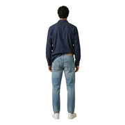 A pair of light-wash denim jeans with classic five-pocket design and subtle fading for men by gianni lupo