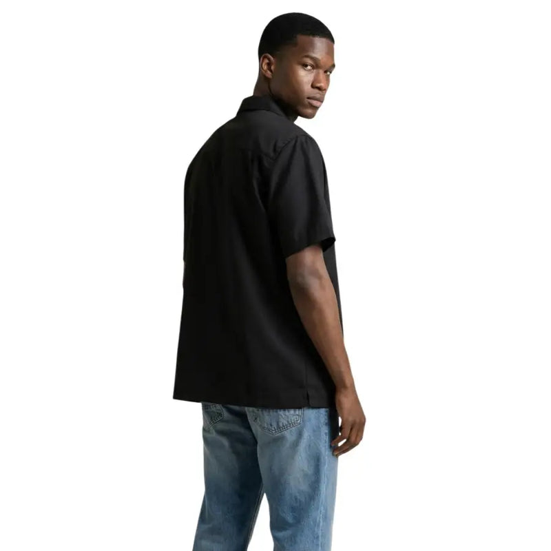 Black short-sleeved button-up shirt with classic collar and tailored fit by Gianni Lupo for men