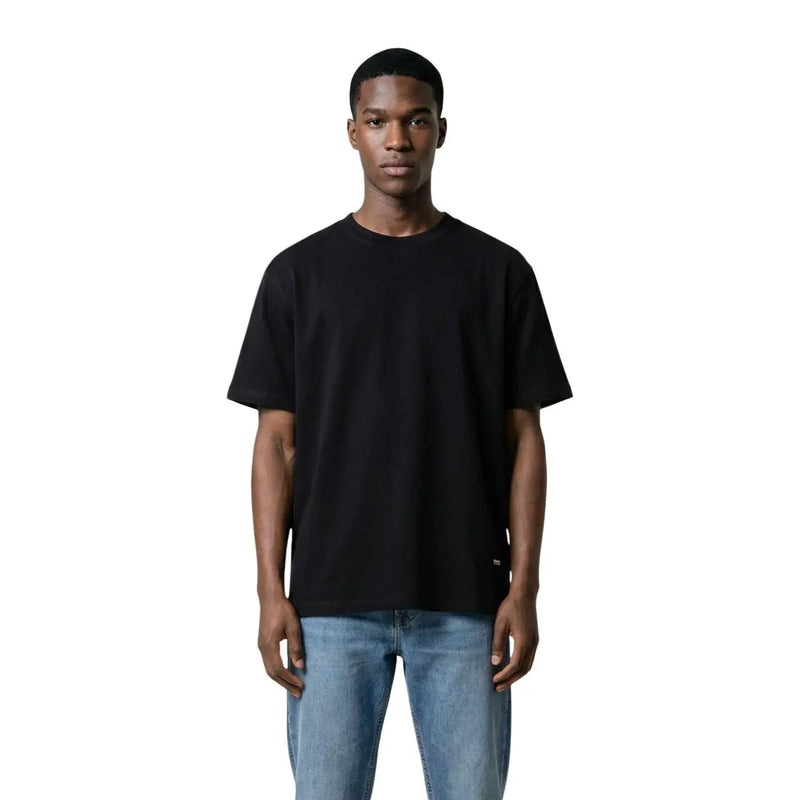 Black oversized crewneck t-shirt with subtle brand tag made of 100% cotton by Gianni Lupo for men