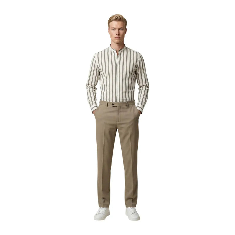 A man wearing a gianni lupo men shirt with cream and dark gray vertical stripes and long sleeves