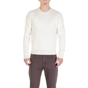 Cream-colored crew neck sweater with ribbed detailing and a classic fit.