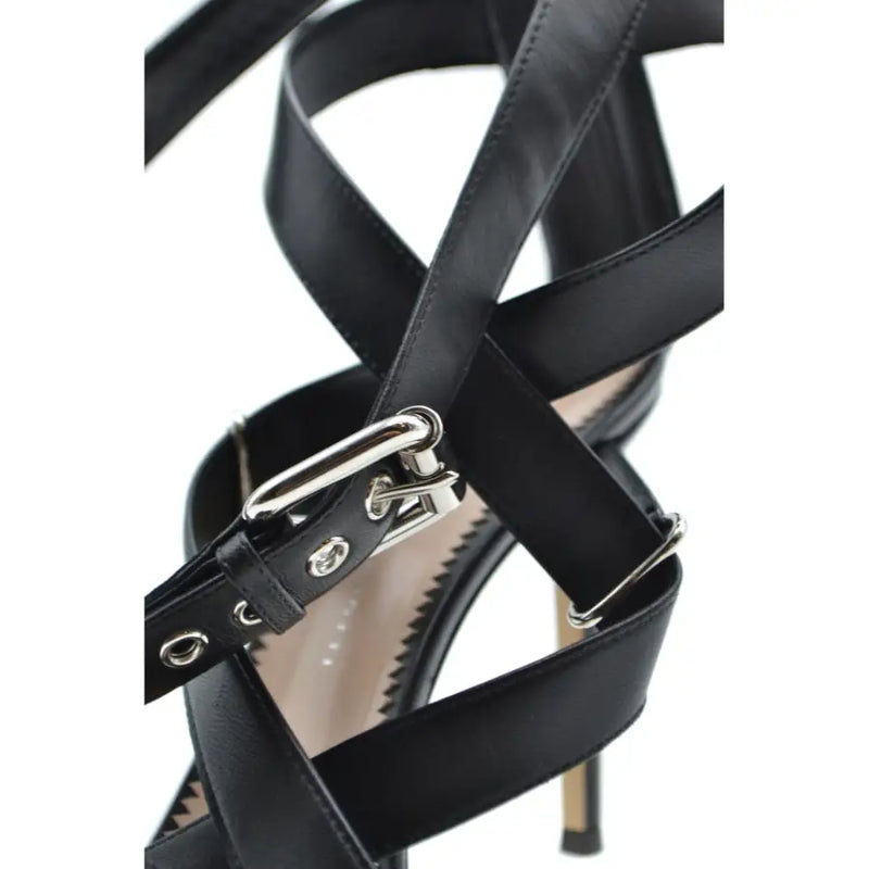 Giuseppe Zanotti black leather stiletto sandals with silver buckle and hardware featuring zip detail
