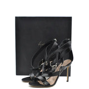 Black leather Giuseppe Zanotti stiletto sandals with silver buckle details and zip closure for elegant wear