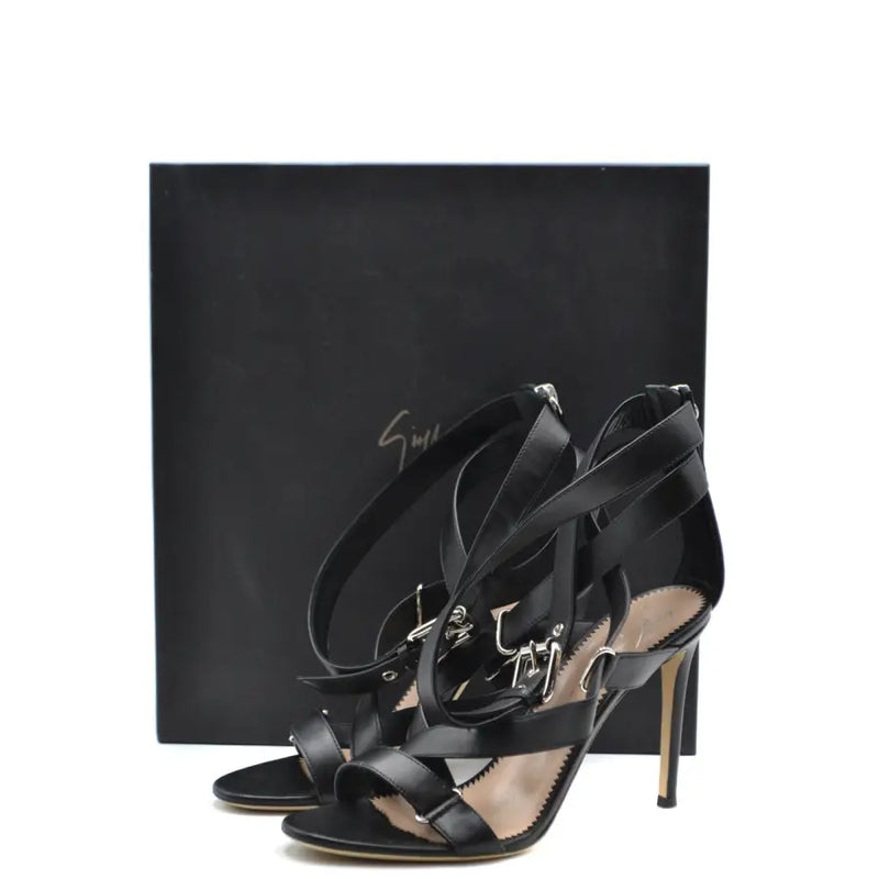 Black leather Giuseppe Zanotti stiletto sandals with silver buckle details and zip closure for elegant wear