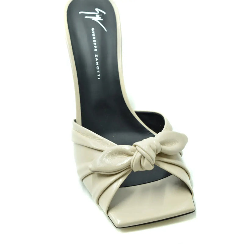 Beige leather giuseppe zanotti mule sandal with square toe and knotted bow detail in white leather block heel slippers style