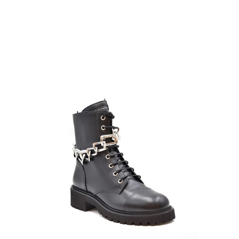 Black leather ankle boot by Giuseppe Zanotti with silver chain-link detail around the ankle and side zip closure