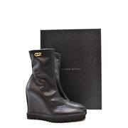 Giuseppe Zanotti women black leather wedge ankle boots with block heel and gold-tone logo emblem on the side