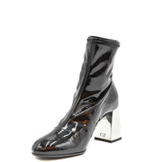Giuseppe Zanotti women black leather ankle boot with glossy patent finish and metallic silver block heel