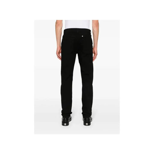 Black cotton slim fit stretch denim jeans for men by Givenchy featuring subtle stitching details