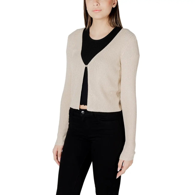 Beige ribbed knit gold lurex button front cardigan with v neck and black contrast panel at neckline and front