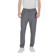 Gray drawstring pants displayed with Gianni Lupo Men’s Beige Trousers with Pockets