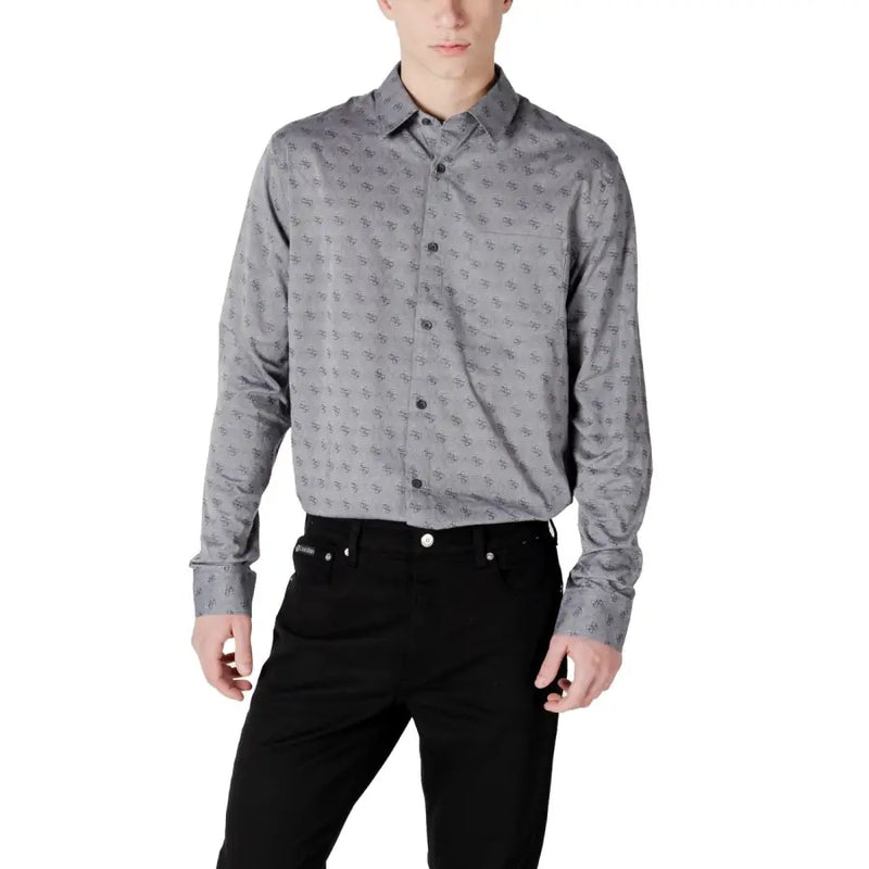 Gray patterned men’s long sleeved button down shirt with subtle dark gray abstract symbols on fabric