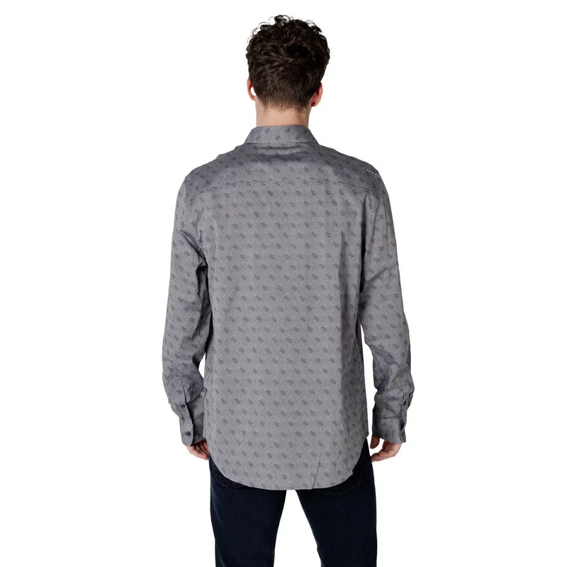 Gray patterned men’s long sleeved shirt featuring a subtle repeating pattern of small dark gray abstract shapes