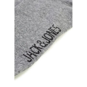 Gray cotton sock displaying brand name for comfortable everyday wear