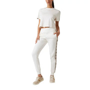Guess Active women beige cotton round neck t-shirt with white cropped short sleeves and subtle logo stripe on side seam
