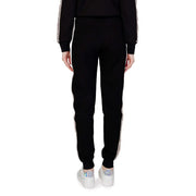 Guess active women black cotton joggers with white side stripes and subtle pattern for fall winter wear