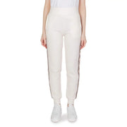 Cream-colored guess active high-waisted cotton joggers with black and white patterned side stripes for fall winter