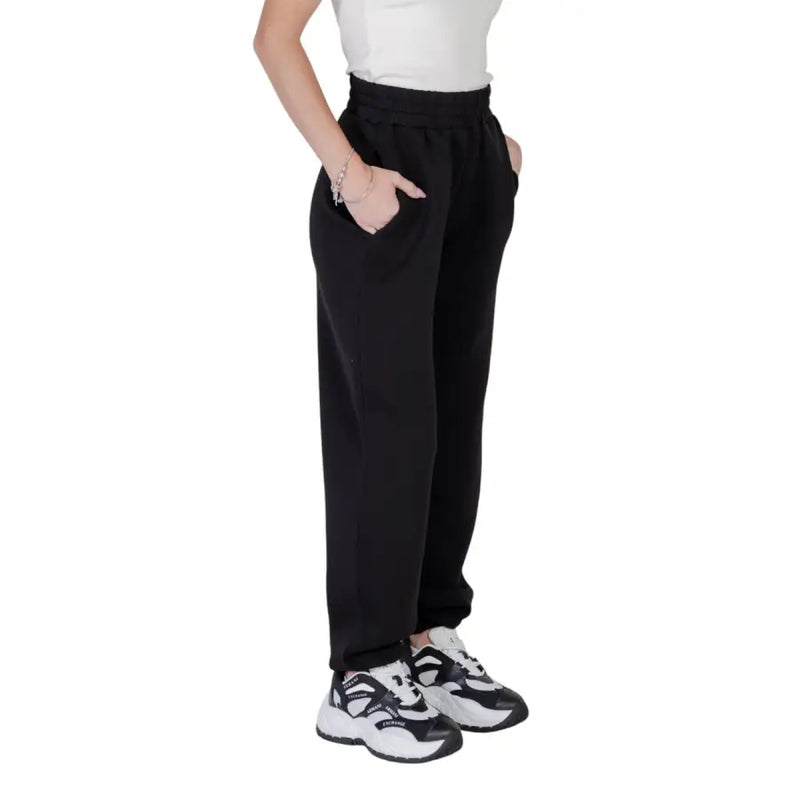 Guess active women black printed trousers with laces featuring elastic waist side pockets and a relaxed fit