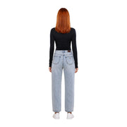 Light-wash denim jeans with high-rise wide-leg cut and classic back pockets shown alongside Guess active women black viscose long sleeve t shirt