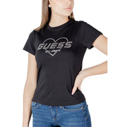 Black guess active women round neck tee featuring a heart-shaped rhinestone logo with guess los angeles text