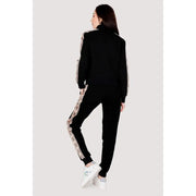 Guess active women’s black zip sweatshirt with pink and white patterned side stripes made of 100% cotton