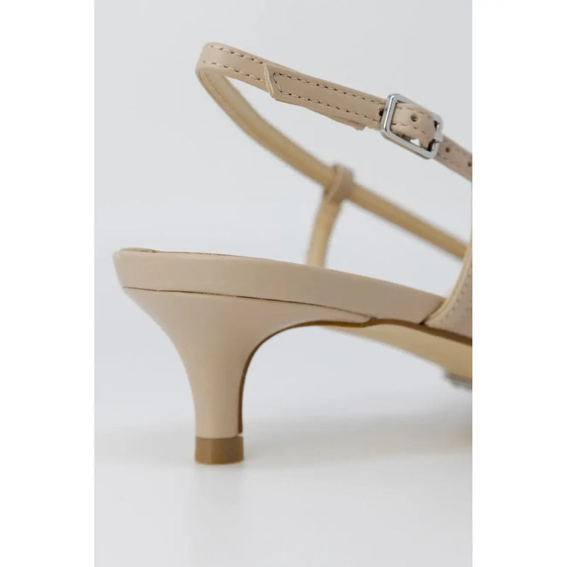 Guess beige leather strappy sandal with silver buckle and low rounded heel shown from the back side