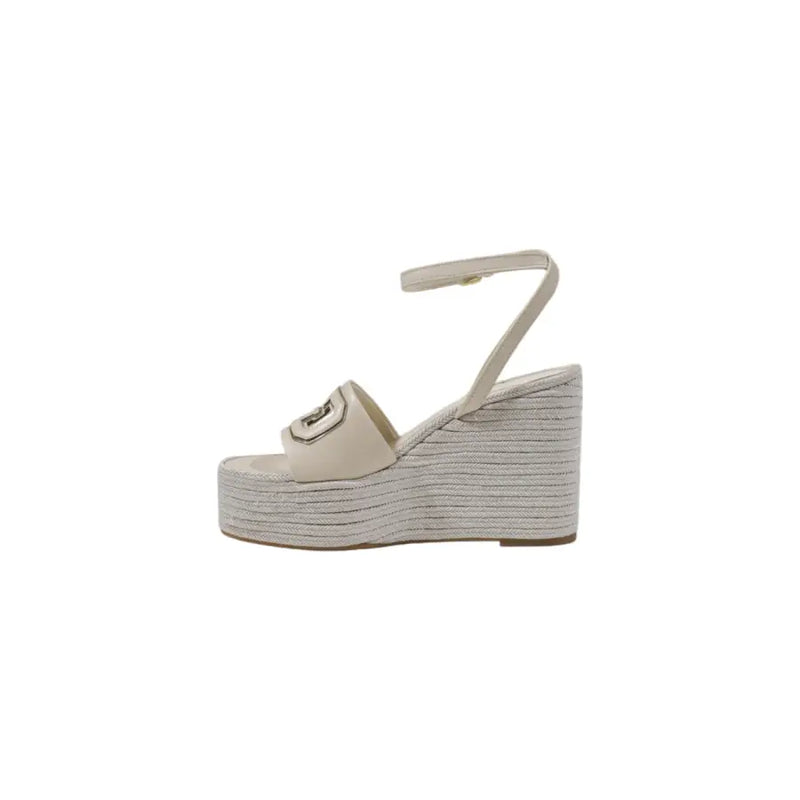 Cream-colored Guess wedge espadrille sandal with woven rope sole and metallic logo buckle in beige tone