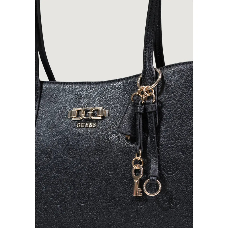 Black Guess polyurethane tote bag with embossed logo pattern and metallic hardware accents featuring multiple pockets