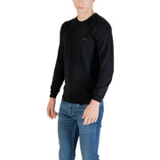 Guess men black knitwear round neck wool blend sweater with long sleeves and subtle embroidered logo on left chest