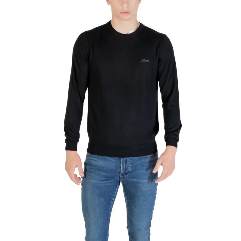 Guess men black knitwear round neck wool blend sweater with long sleeves and subtle embroidered logo on left chest