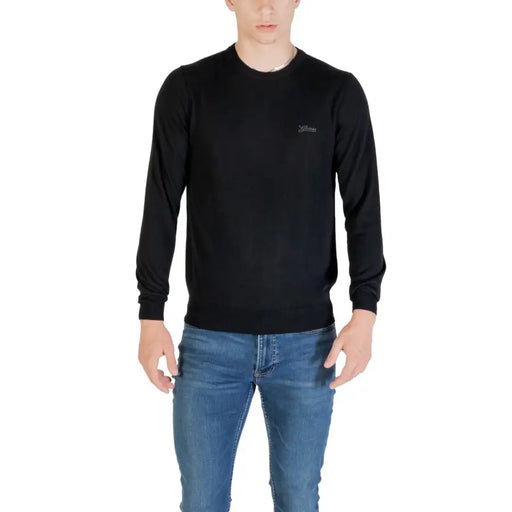Guess men black knitwear round neck wool blend sweater with long sleeves and subtle embroidered logo on left chest