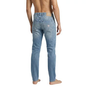 Light-wash denim Guess men jeans in blue cotton stretch with classic five-pocket design and logo on back pocket