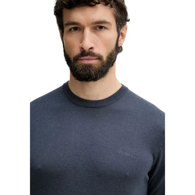 Guess men knitwear dark blue long sleeve crewneck sweater with subtle embroidered logo on left chest