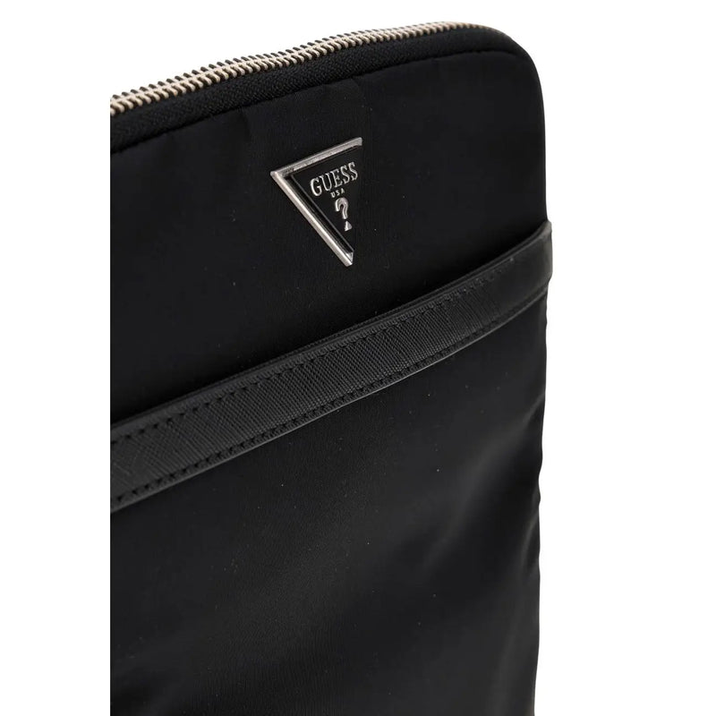 Black guess nylon laptop sleeve with silver triangular logo and zipper trim designed for men by guess milano