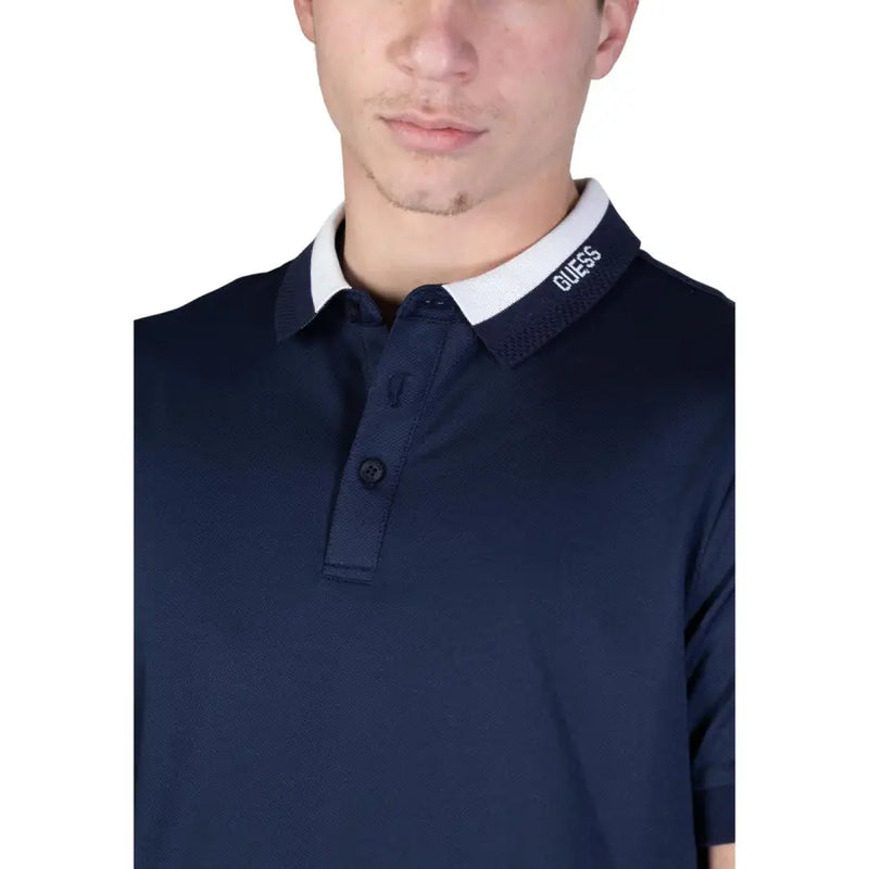 Guess men polo shirt navy blue cotton short sleeve with white collar and Guess logo embroidered on inner collar edge