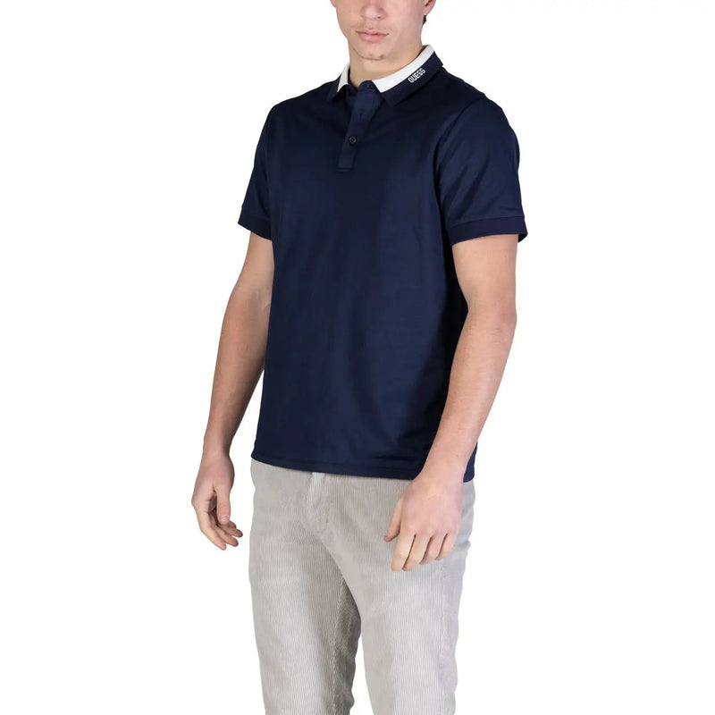 Navy blue Hugo Boss polo shirt with white collar and brand logo on placket made of cotton short sleeve material