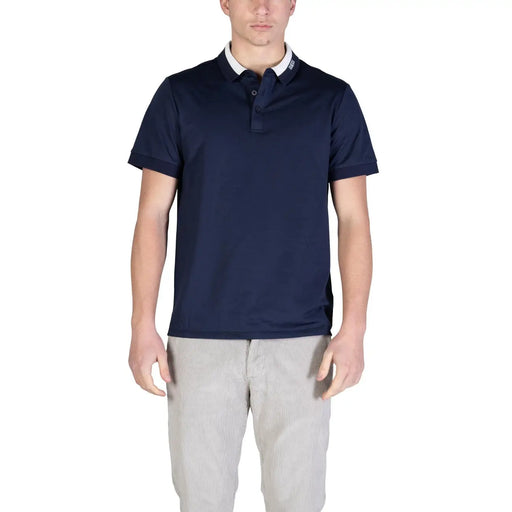 Navy blue cotton short sleeve Guess men polo shirt with white collar and subtle logo on the placket