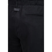 Guess men regular leg black cotton trousers with subtle woven pattern and branded label on waistband