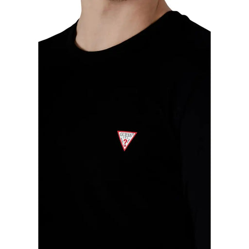 Black Guess men t-shirt with a small red triangular embroidered logo on the chest in cotton fabric