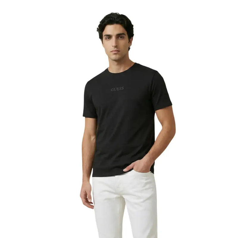 Black Guess men t-shirt in cotton fabric with subtle embroidered logo on the chest for casual wear